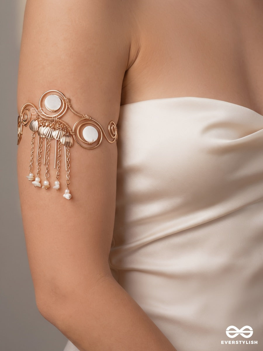 Shankhreva – Shell Flow – Festive Single Armlet With Shell-Like Charms, Golden Swirl Work, Pearl Hangings And Delicate Chain Drops