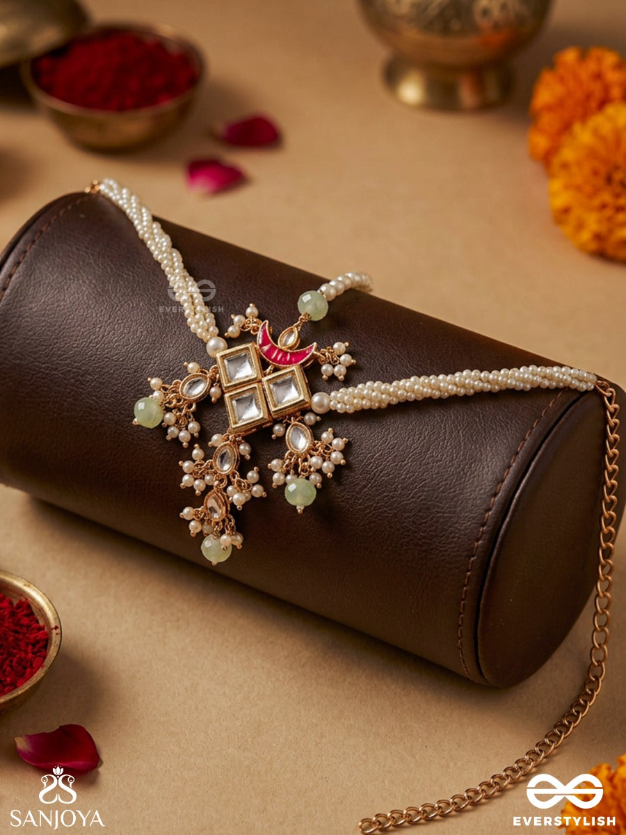 Mrinaya – Tender Bloom – Delicate Necklace With Pearl-Lined Chain, Ornamental Center Detail, Soft Red Crescent And Dainty Drop Hangings