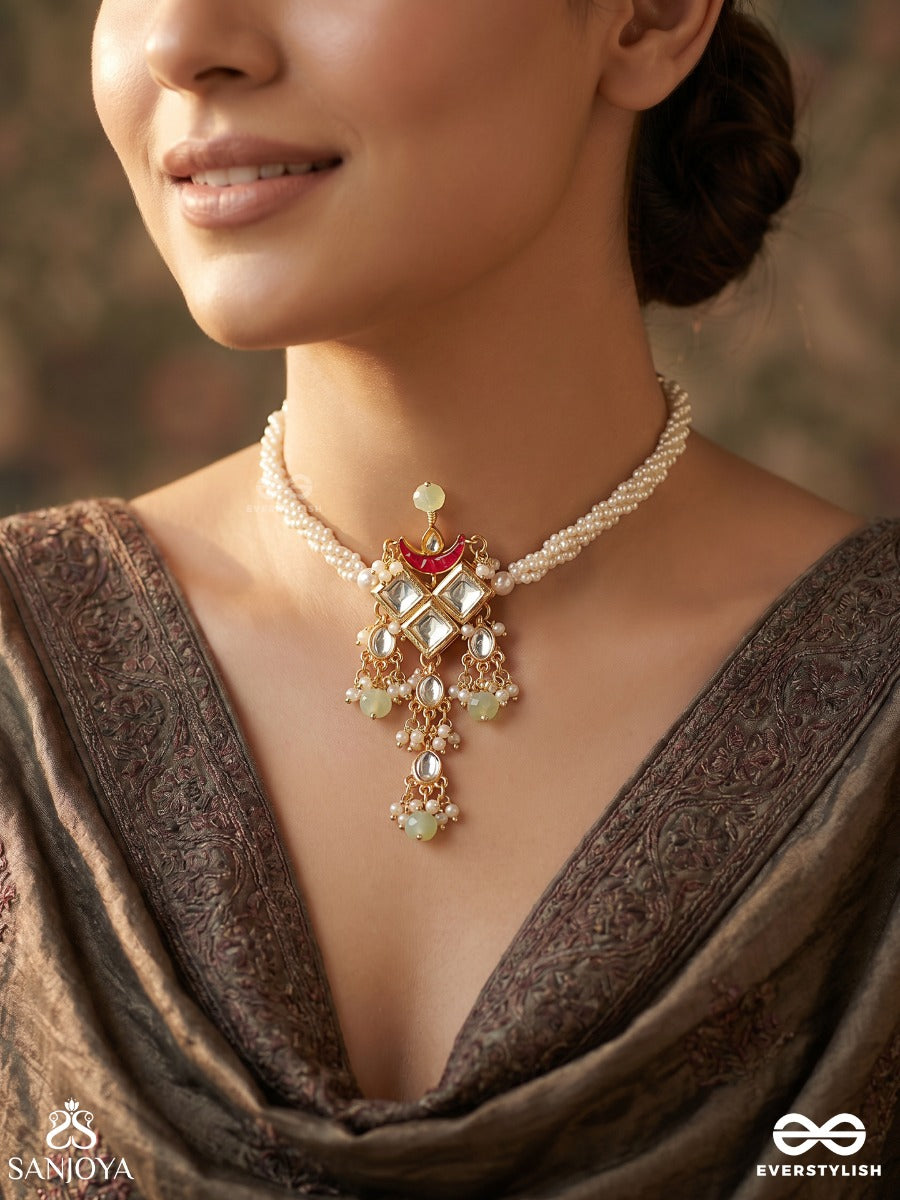 Mrinaya – Tender Bloom – Delicate Necklace With Pearl-Lined Chain, Ornamental Center Detail, Soft Red Crescent And Dainty Drop Hangings