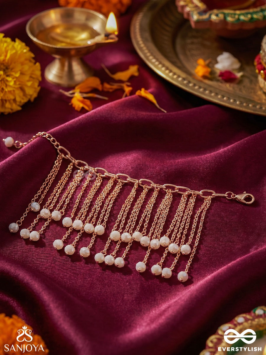 Sajlehra – Adorned Wave – Elegant Hanging Bracelet With Multi-Strand Gold-Tone Chains, Pearl-Like Drop Accents And A Flowing Tassel Finish