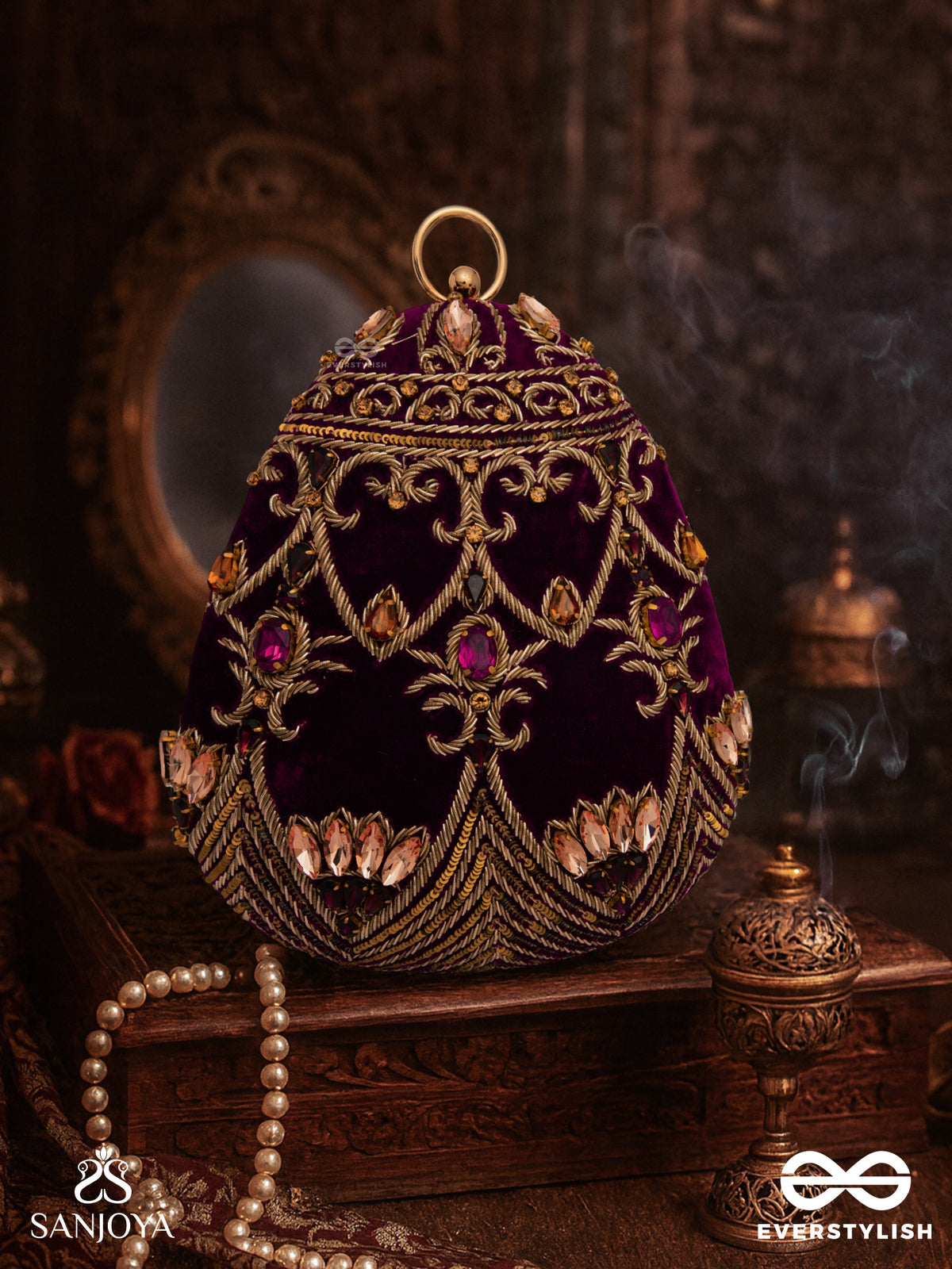 Zeenat – Oval Dark Pink Velvet Clutch With Detailed Embellishment And Golden Metal Frame