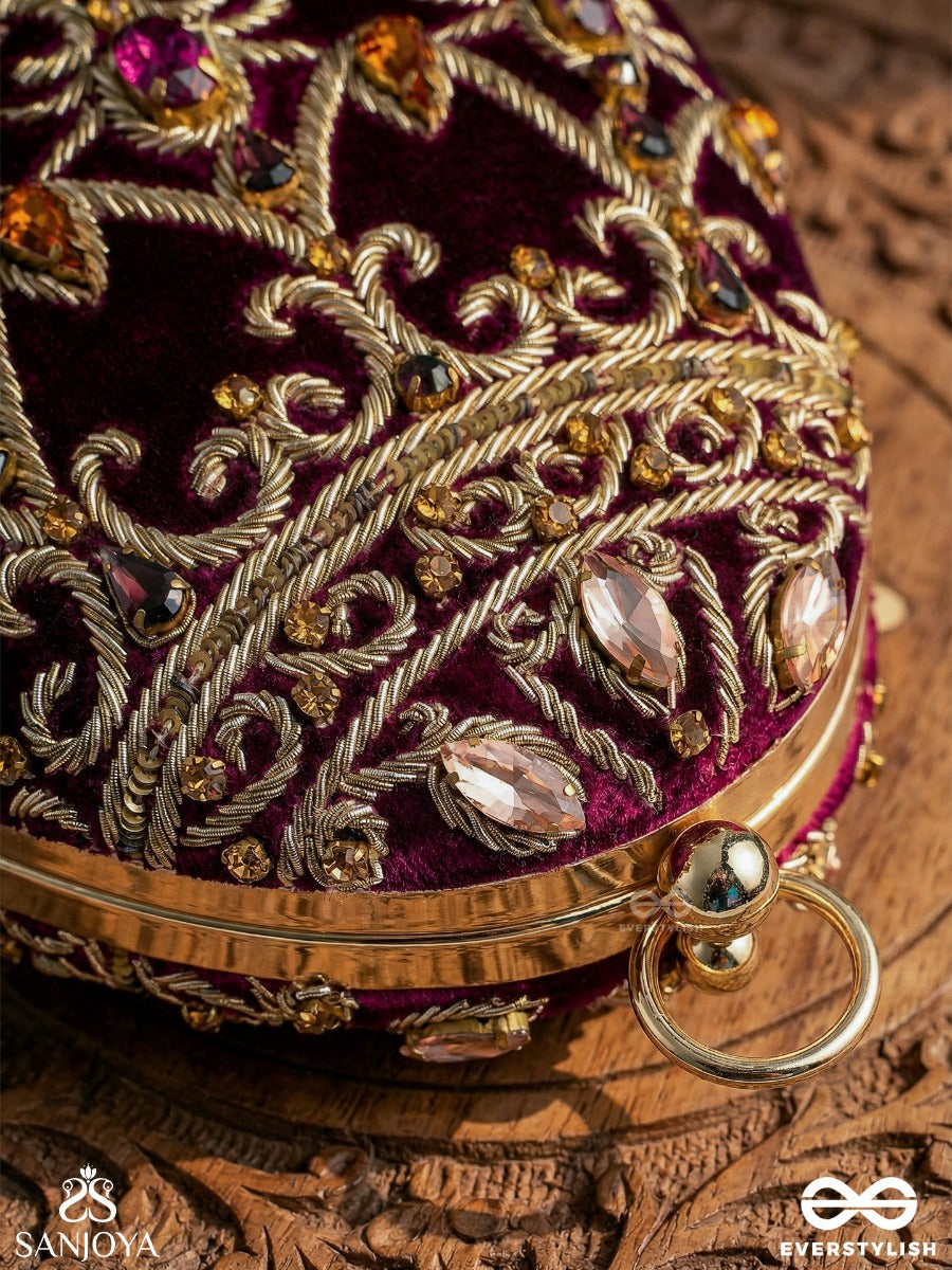 Zeenat – Oval Dark Pink Velvet Clutch With Detailed Embellishment And Golden Metal Frame