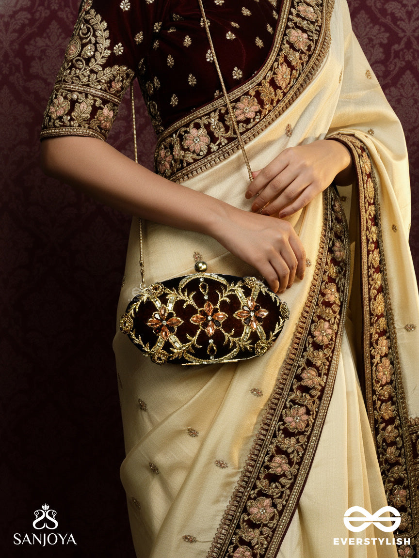 Rohini – Polished Bronze Brown Textile Clutch With Faceted Jewel Accents And Golden Metal Frame