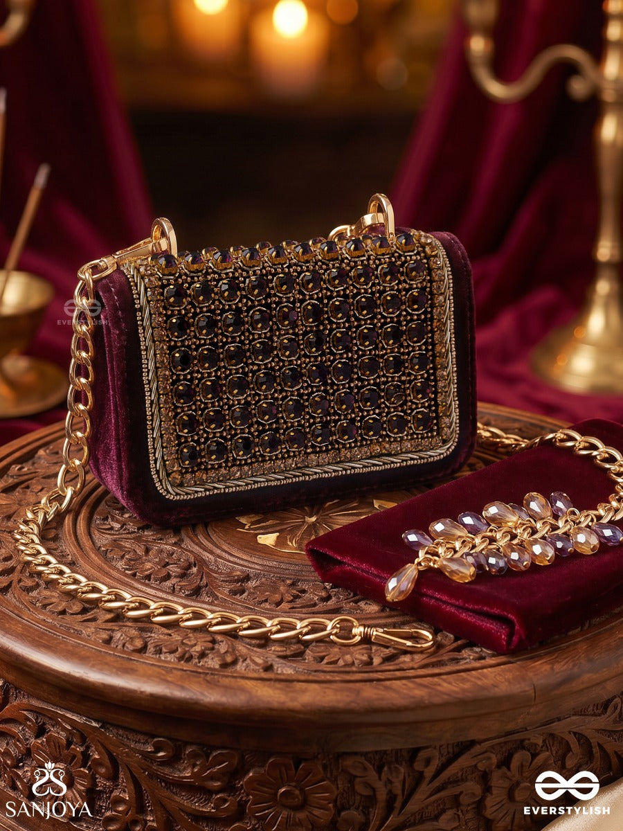 Ratnapriya – Rectangular Wine Velvet Clutch With Ruby Gem Lattice Embellishment, Gold Framework And Gem Tassel
