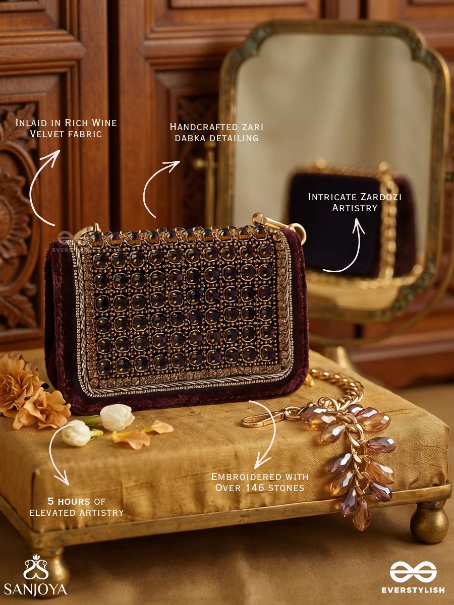 Ratnapriya – Rectangular Wine Velvet Clutch With Ruby Gem Lattice Embellishment, Gold Framework And Gem Tassel