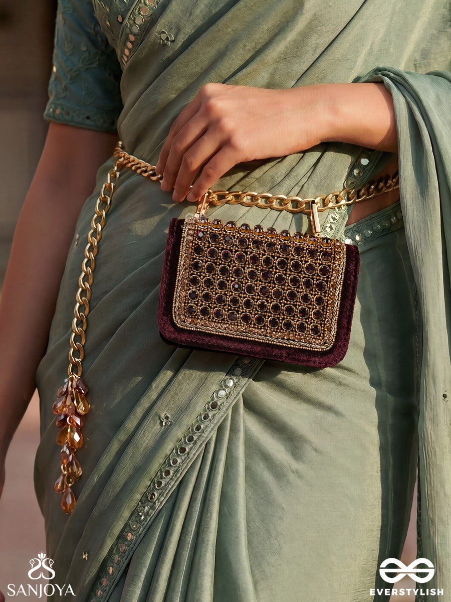 Ratnapriya – Rectangular Wine Velvet Clutch With Ruby Gem Lattice Embellishment, Gold Framework And Gem Tassel
