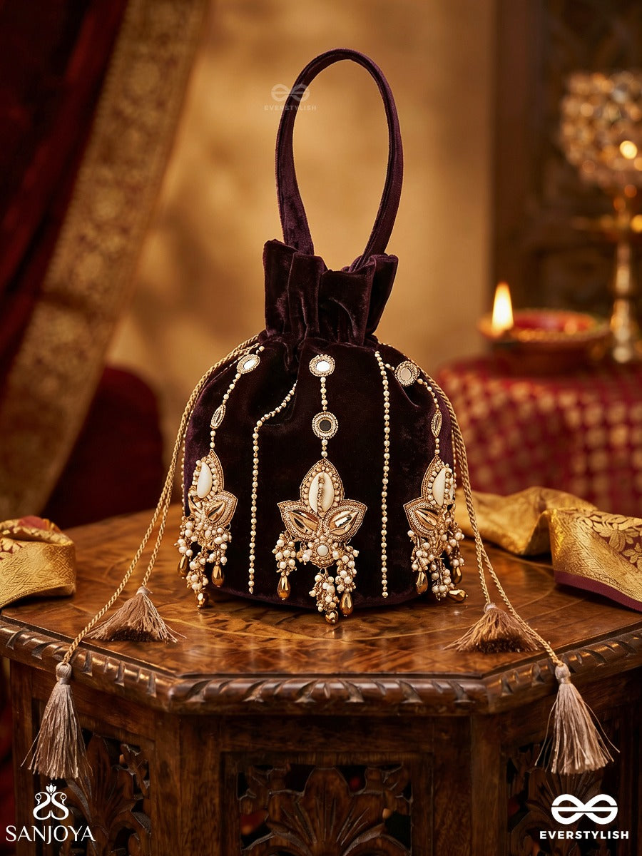 Shahzebaan – Potli Rich Wine Bag With Festive Appliqué Detailing, Pearl Highlights And Braided Tie Ends