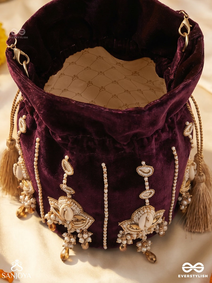 Shahzebaan – Potli Rich Wine Bag With Festive Appliqué Detailing, Pearl Highlights And Braided Tie Ends
