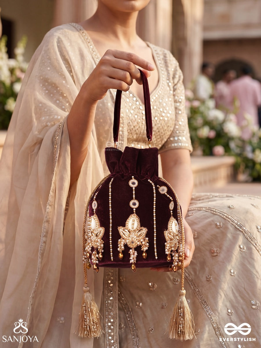 Shahzebaan – Potli Rich Wine Bag With Festive Appliqué Detailing, Pearl Highlights And Braided Tie Ends
