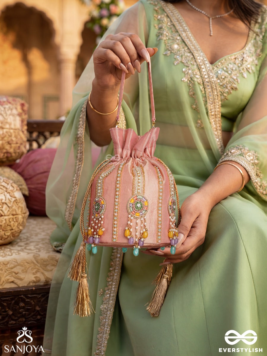 Kainaat – Potli Soft Peach Bag With Multistone Detailing, Jeweled Line Accents And Side Tassels