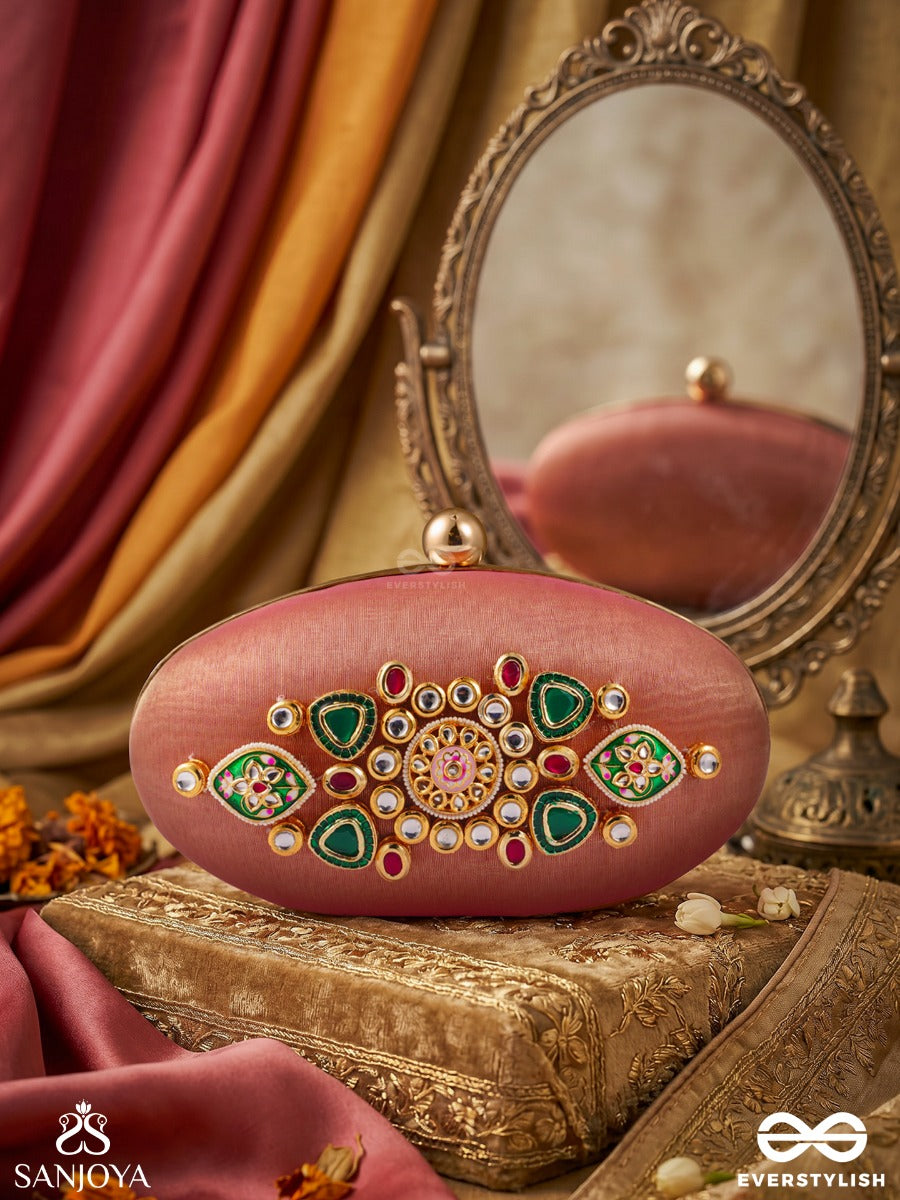 Kainaat – Oval Peach Silk Clutch With Kundan Ornamentation, Floral Enamel Work And Gem Highlights