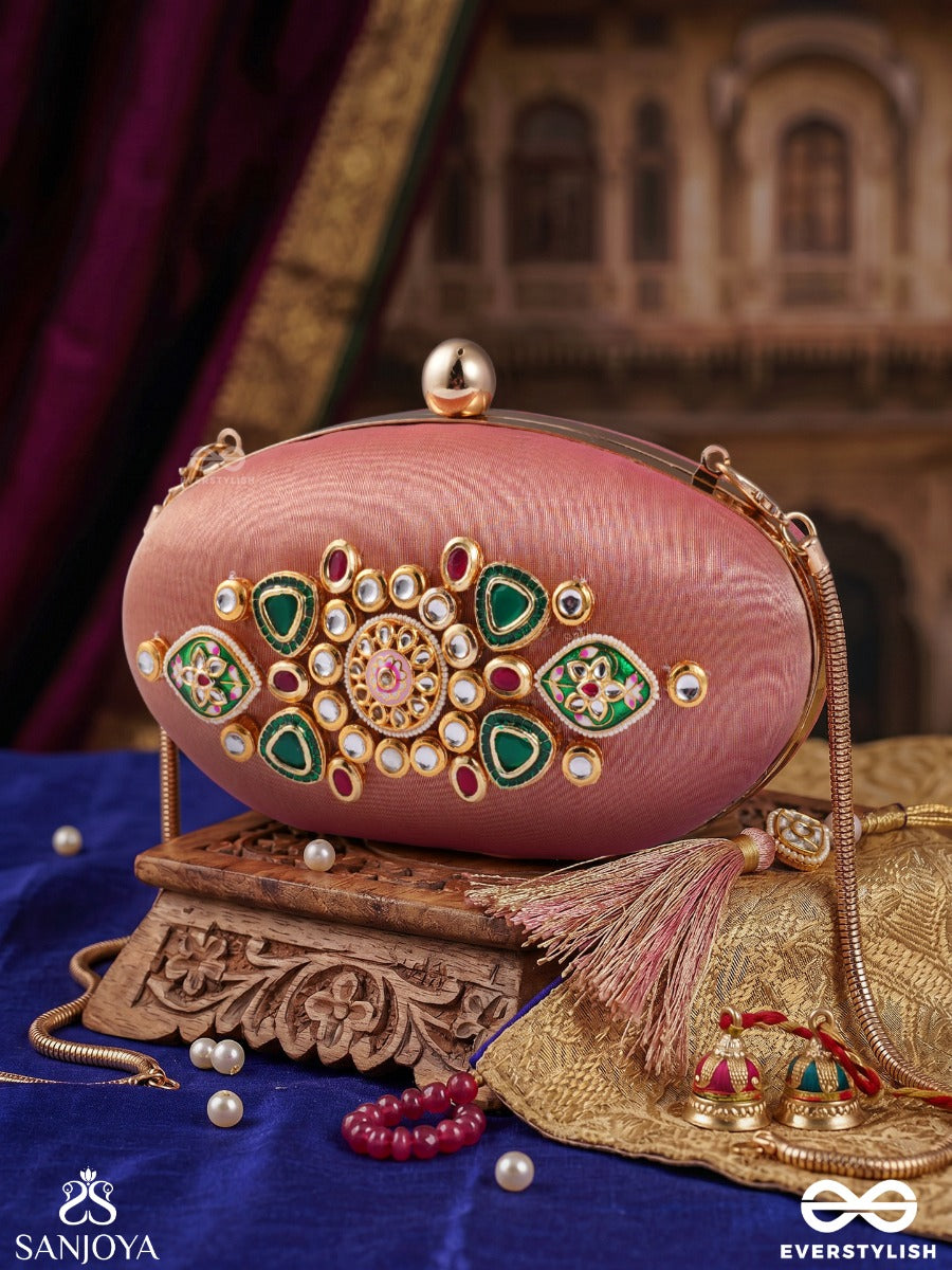 Kainaat – Oval Peach Silk Clutch With Kundan Ornamentation, Floral Enamel Work And Gem Highlights
