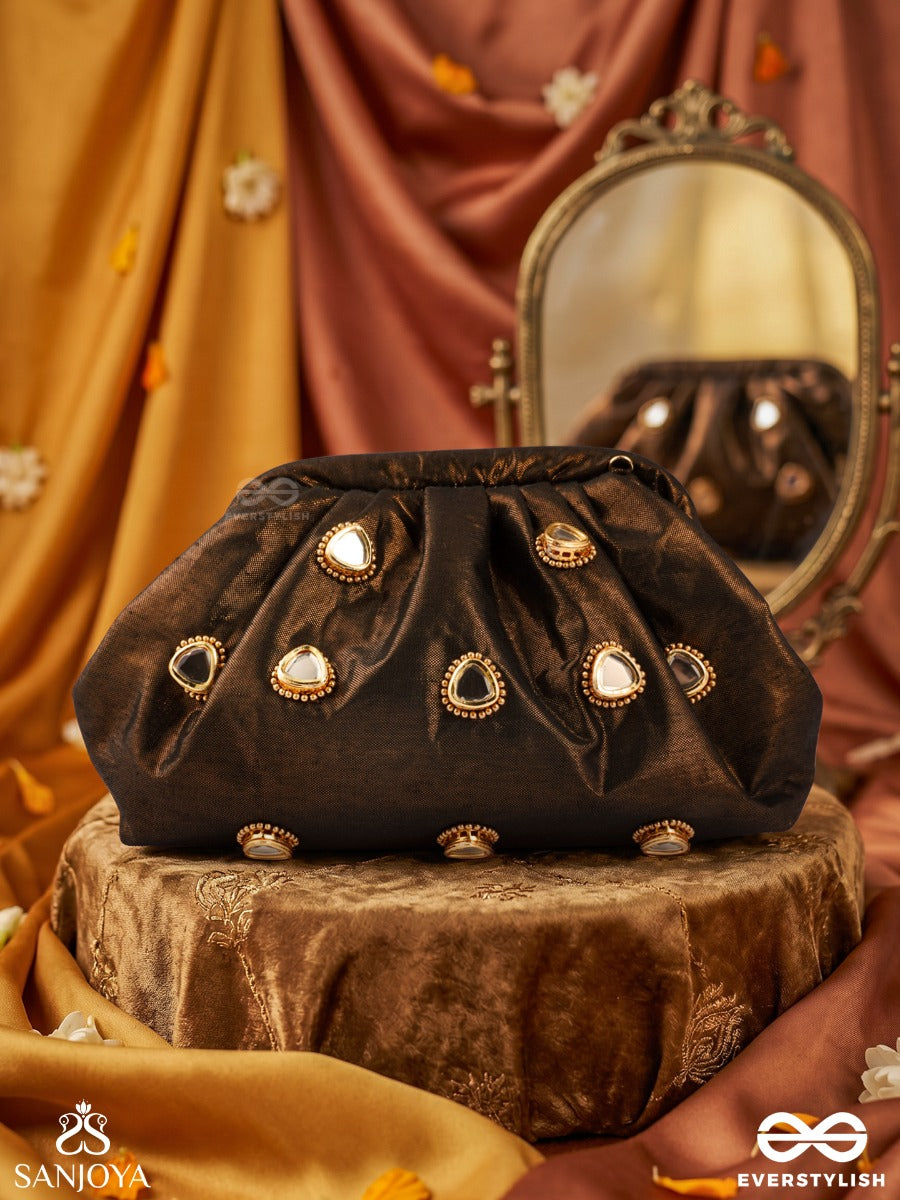 Raunaq – Cocoa Bronze Silk Clutch With Teardrop Kundan Embellishment, Antique Highlights And Gathered Silhouette